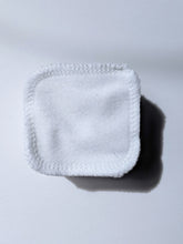 Load image into Gallery viewer, a stack of white cotton reusable facial rounds
