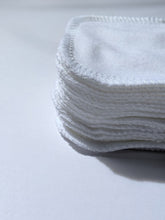 Load image into Gallery viewer, the side view of the stack of white cotton facial rounds