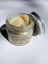 Load image into Gallery viewer, a small jar of cream deodorant. It is in a glass jar with a tin lid.