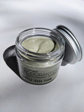 Load image into Gallery viewer, a small jar of cream deodorant. It is in a glass jar with a tin lid.