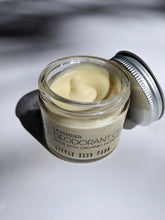 Load image into Gallery viewer, a small jar of cream deodorant. It is in a glass jar with a tin lid.