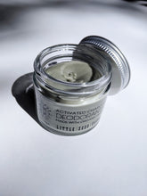 Load image into Gallery viewer, a small jar of cream deodorant. It is in a glass jar with a tin lid.