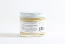 Load image into Gallery viewer, the back of the booty balm jar that says it is cloth diaper safe and certified organic