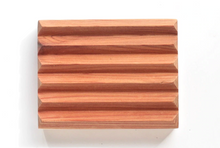 Load image into Gallery viewer, a handmade wooden soap dish with rivets to prevent the soap from slipping