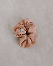 Load image into Gallery viewer, a close up of a rose colored scrunchie
