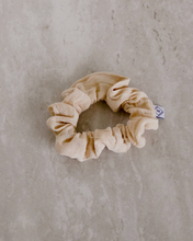 Load image into Gallery viewer, a cream colored gauze scrunchie