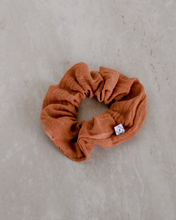 Load image into Gallery viewer, a burnt orange colored gauze scrunchie