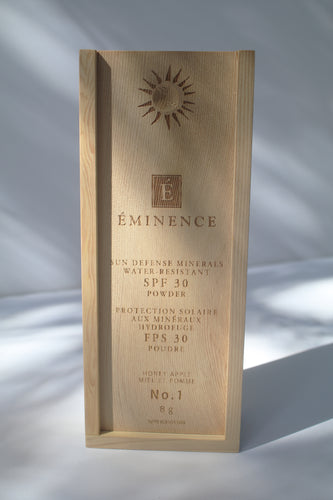 a wooden box containing Sun Defense Mineral Powder, shade Honey Apple, by Eminence