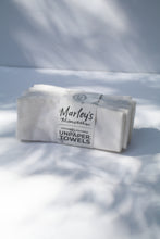 Load image into Gallery viewer, a bundle of unpaper towels in white by Marley's Monsters