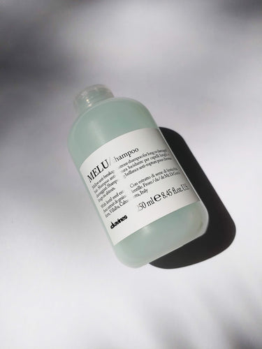 a bottle of MELU shampoo by Davines