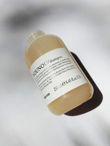 a bottle of NOUNOU shampoo by Davines