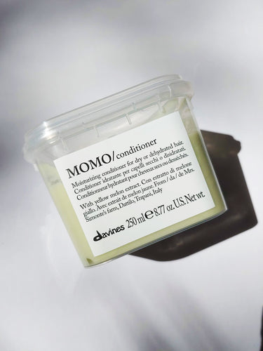 a jar of MOMO conditioner by Davines