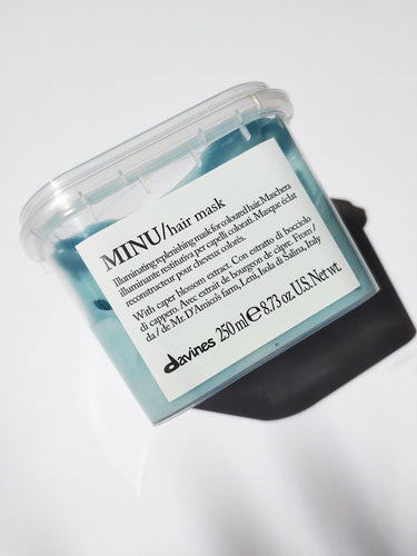 a jar of MINU hair mask by Davines