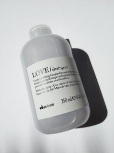 a full size bottle of LOVE Smoothing shampoo by Davines