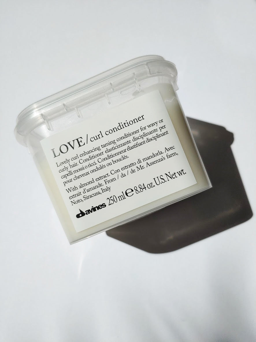 a jar of LOVE curl conditioner by Davines