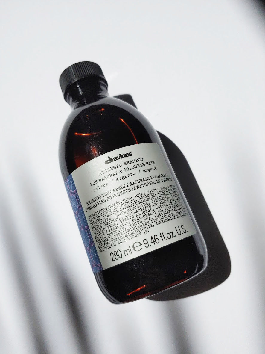 a bottle of alchemic shampoo by Davines - for natural or coloured silver or blonde hair