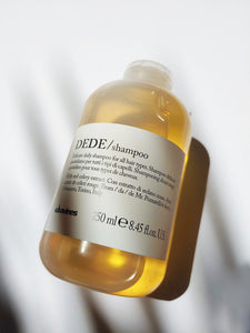 a bottle of the Dede Shampoo - it is yellow in color