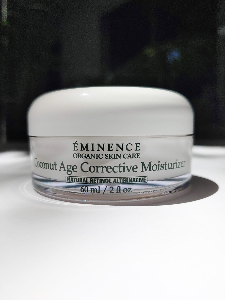 a jar of the Coconut Age Corrective Moisturizer by Eminence. the jar is short and wide.