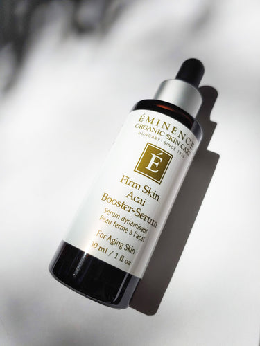 a bottle of firm skin acai booster serum by Eminence
