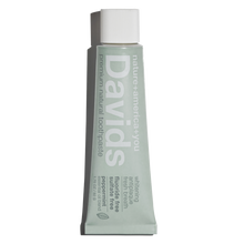 Load image into Gallery viewer, a travel size tube of David&#39;s Natural Toothpaste. it says &quot;Premium Natural Toothpaste. Whitening, Antiplaque, Fresh Breath, Flouride Free, Sulfate Free. Peppermint essential oil blend&quot;

