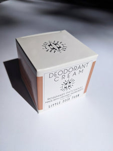 the box that the deodorant comes in that says "Deodorant Cream - rosemary patchouli. made with organic ingredients."
