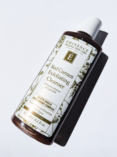 a bottle of red currant exfoliating cleanser