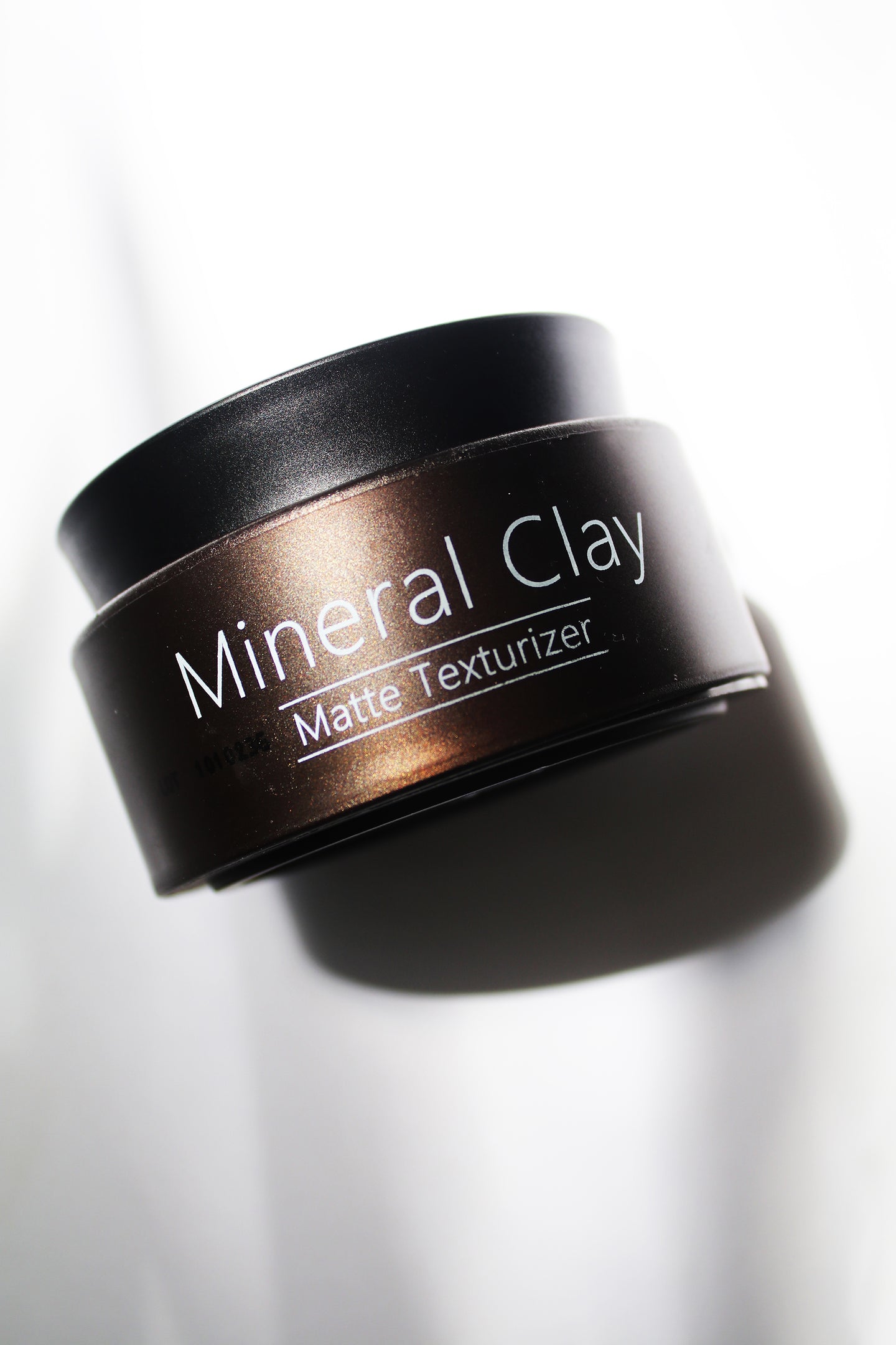 a jar of mineral clay texturizer by Davines