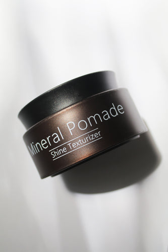 a jar of mineral pomade texturizer by Saphira