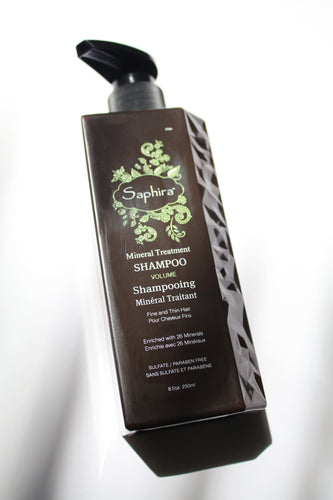 a bottle of mineral treatment shampoo by Saphira - the bottle has a pump lid