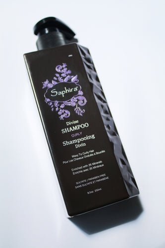 a bottle of Divine Shampoo for curly hair by Saphira