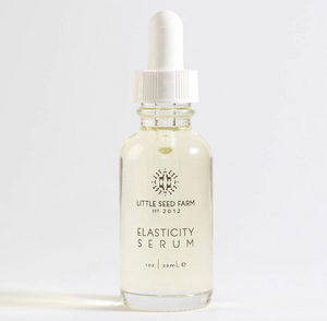 a bottle of elasticity serum by Little Seed Farm