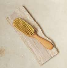 Load image into Gallery viewer, a light colored wooden hair brush with vegan bristles
