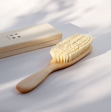 Load image into Gallery viewer, a light colored wooden hair brush with vegan bristles
