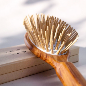 a closer look at the natural wooden brush with light wood bristles