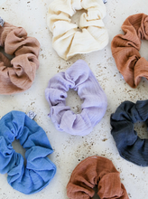 Load image into Gallery viewer, multiple gauze scrunchies laying next to each other varying in color

