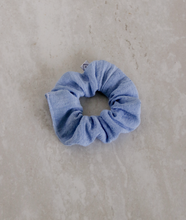 Load image into Gallery viewer, a light blue colored gauze scrunchie
