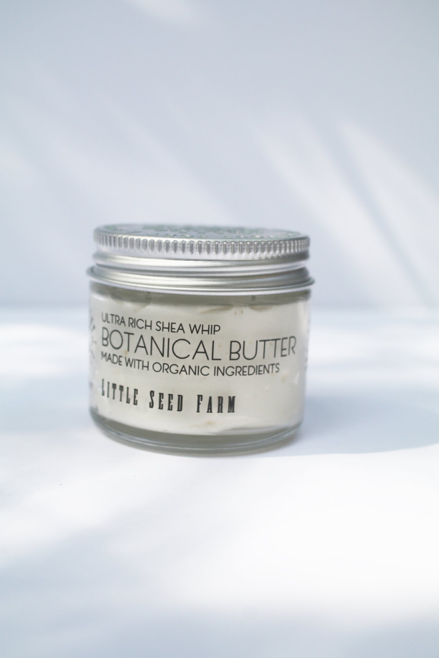 a jar of botanical butter by Little Seed Farm