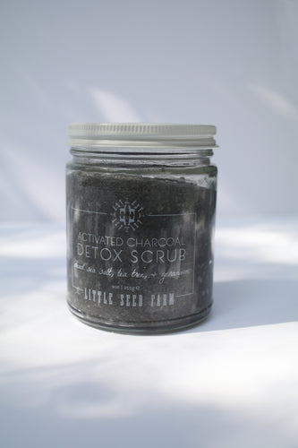 a jar of activated charcoal detox scrub by Little Seed Farm