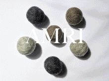Load image into Gallery viewer, the wool dryer balls in a looping gif, where the wool dryer balls change color
