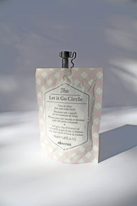 a single use "Let It Go Circle" hair mask by Davines - the hair mask comes in a pouch