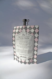 a single use "Purity Circle" hair mask by Davines - the hair mask comes in a pouch