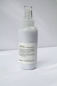a bottle of LOVE Smoothing Perfector by Davines