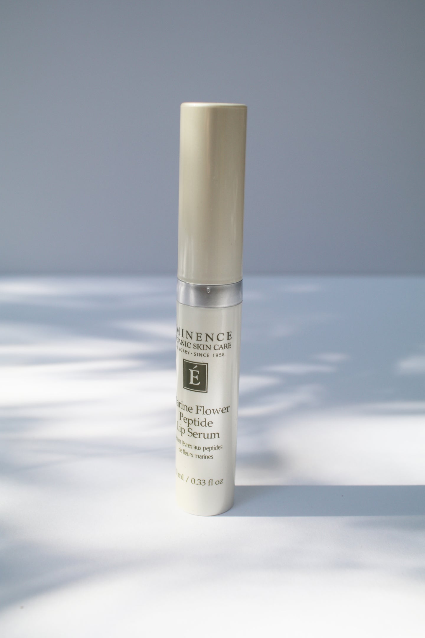 a container of marine flower peptide lip serum by Eminence