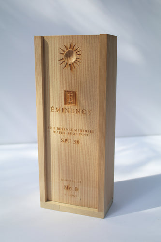 a wooden box containing Sun Defense Mineral Powder, shade Translucent, by Eminence