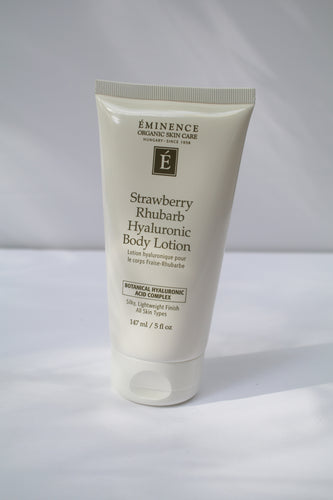 a bottle of Strawberry Rhubarb Hyaluronic Body Lotion by Eminence