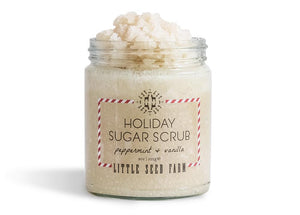 a jar of holiday sugar scrub by Little Seed Farm and you can see the sugar scrub