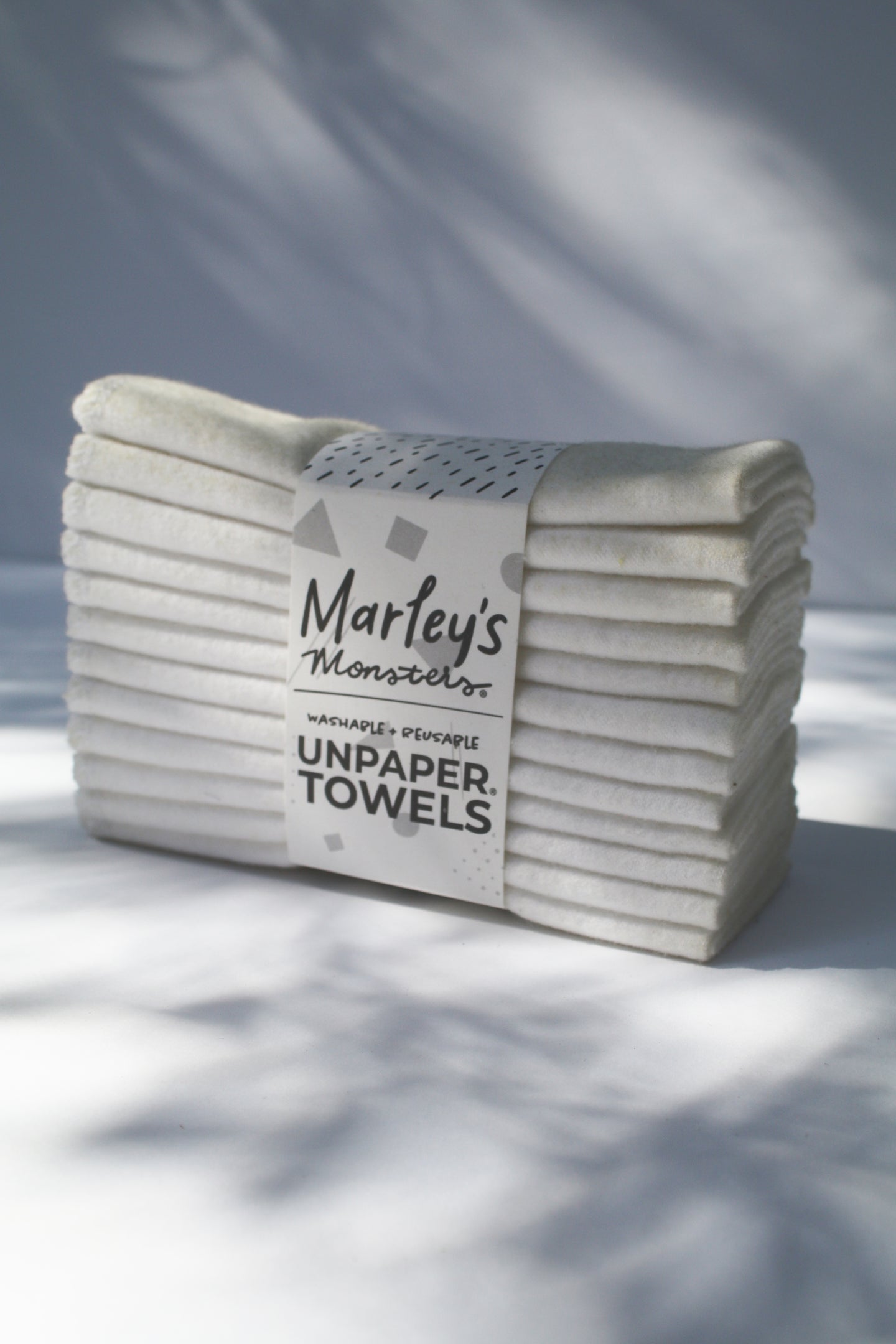 a large bundle of white unpaper towels by Marley's Monsters